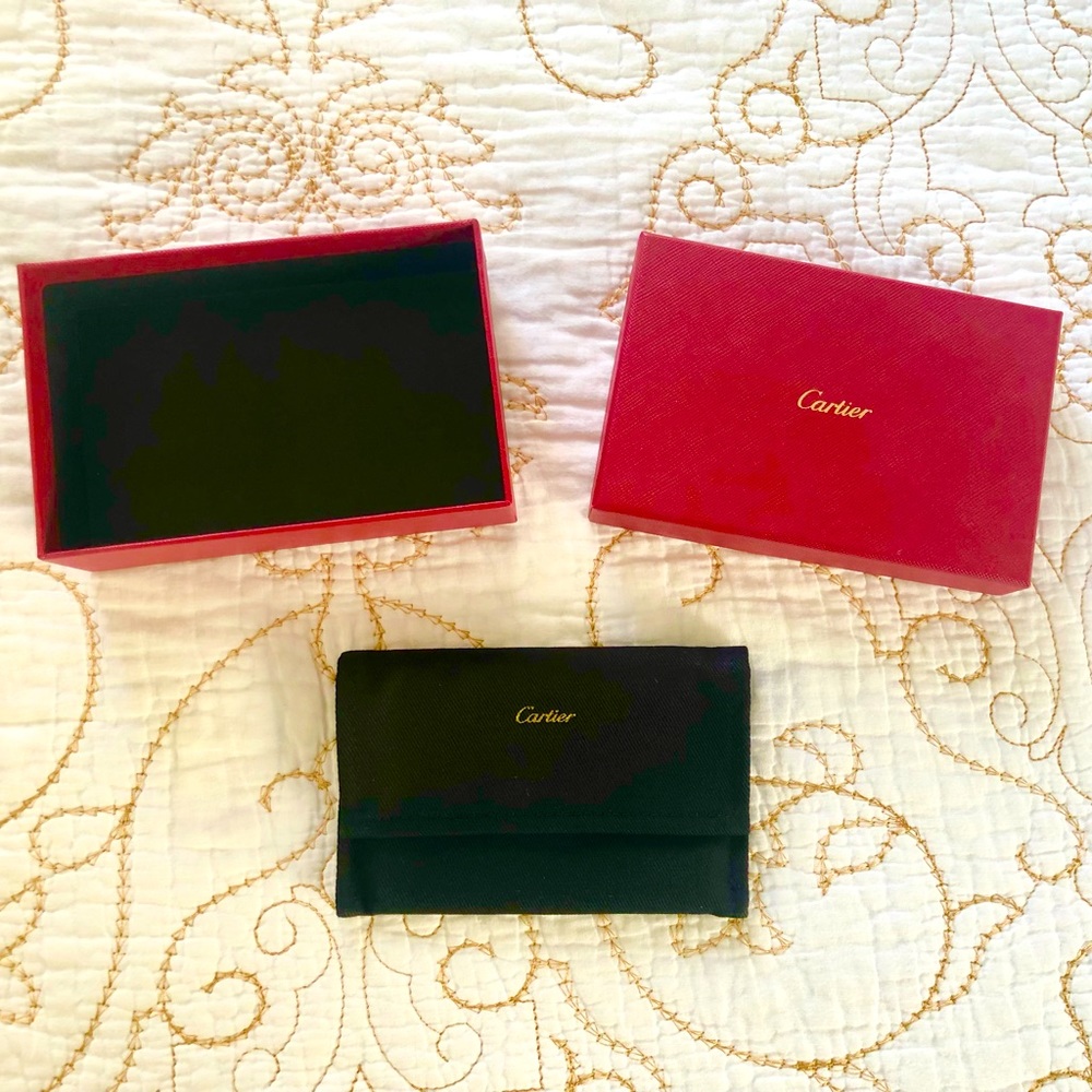 Cartier box with little pouch.